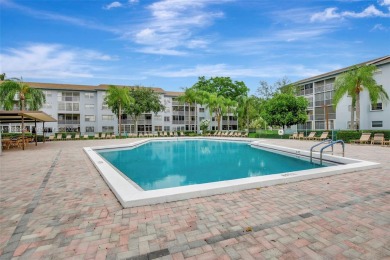 Impeccably upgraded fourth-floor unit featuring two bedrooms and on Flamingo Lakes Country Club in Florida - for sale on GolfHomes.com, golf home, golf lot