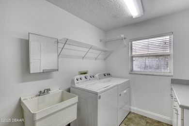 Come view this rarely available 4 bedroom, 2.5-bathroom ranch on Spruce Creek Golf Club in Florida - for sale on GolfHomes.com, golf home, golf lot