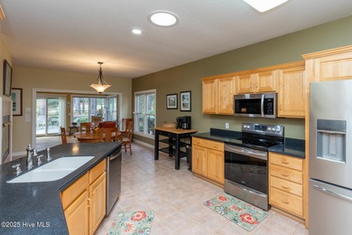 Welcome to this 3-bedroom 2-bathroom home perfectly positioned on Talamore Golf Club in North Carolina - for sale on GolfHomes.com, golf home, golf lot