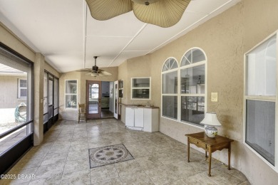 Come view this rarely available 4 bedroom, 2.5-bathroom ranch on Spruce Creek Golf Club in Florida - for sale on GolfHomes.com, golf home, golf lot