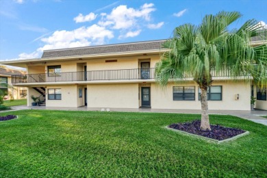 This is the best-priced unit in Villas de Golf and is available on Largo Golf Course in Florida - for sale on GolfHomes.com, golf home, golf lot