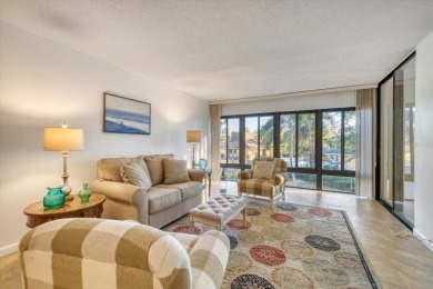 This is the best-priced unit in Villas de Golf and is available on Largo Golf Course in Florida - for sale on GolfHomes.com, golf home, golf lot