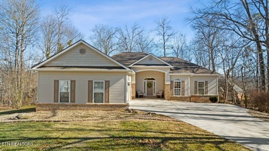 Come experience this immaculately maintained 4-bedroom, 3-bath on Toqua Golf Course - Loudon County in Tennessee - for sale on GolfHomes.com, golf home, golf lot