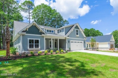 This brand new Riptide home with stunning setting and finishes on Sea Trail Golf Resort in North Carolina - for sale on GolfHomes.com, golf home, golf lot