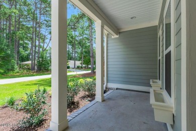 This brand new Riptide home with stunning setting and finishes on Sea Trail Golf Resort in North Carolina - for sale on GolfHomes.com, golf home, golf lot