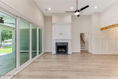 This brand new Riptide home with stunning setting and finishes on Sea Trail Golf Resort in North Carolina - for sale on GolfHomes.com, golf home, golf lot