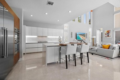 Newly renovated paradise set on an exceptional golf & lakefront on Frenchmans Reserve in Florida - for sale on GolfHomes.com, golf home, golf lot