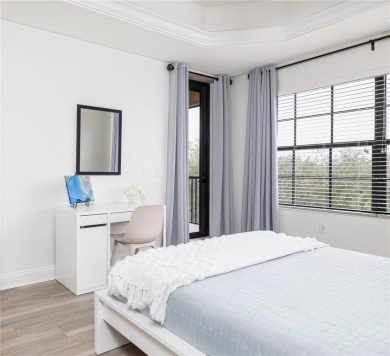 ***NOTE: the sliding door to the balcony is off the living room on Legacy Golf Club in Florida - for sale on GolfHomes.com, golf home, golf lot