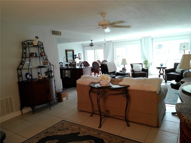 PARADISE!   This classy serene spacious Condo has a panoramic on East Bay Golf Club in Florida - for sale on GolfHomes.com, golf home, golf lot