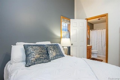 Welcome to this ranch style home built in 2001 offering over 1 on Lost Lake Woods Club in Michigan - for sale on GolfHomes.com, golf home, golf lot