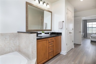 ***NOTE: the sliding door to the balcony is off the living room on Legacy Golf Club in Florida - for sale on GolfHomes.com, golf home, golf lot