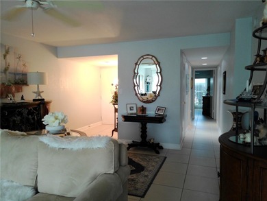 PARADISE!   This classy serene spacious Condo has a panoramic on East Bay Golf Club in Florida - for sale on GolfHomes.com, golf home, golf lot