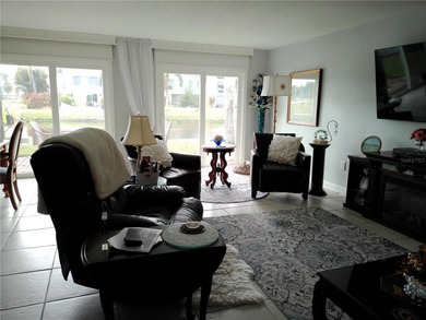 PARADISE!   This classy serene spacious Condo has a panoramic on East Bay Golf Club in Florida - for sale on GolfHomes.com, golf home, golf lot