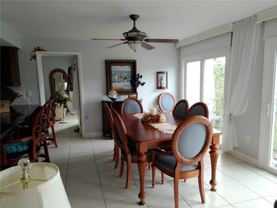 PARADISE!   This classy serene spacious Condo has a panoramic on East Bay Golf Club in Florida - for sale on GolfHomes.com, golf home, golf lot