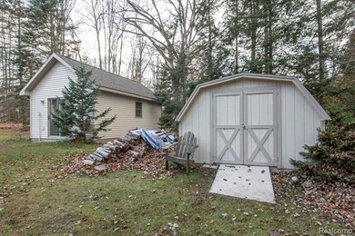 Welcome to this ranch style home built in 2001 offering over 1 on Lost Lake Woods Club in Michigan - for sale on GolfHomes.com, golf home, golf lot