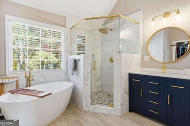 Completely updated and truly move-in ready, this elegant on Windermere Golf Club in Georgia - for sale on GolfHomes.com, golf home, golf lot