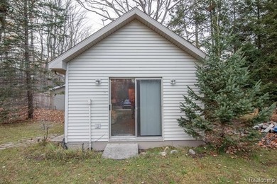 Welcome to this ranch style home built in 2001 offering over 1 on Lost Lake Woods Club in Michigan - for sale on GolfHomes.com, golf home, golf lot