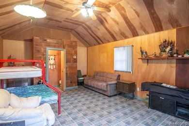 Welcome to this ranch style home built in 2001 offering over 1 on Lost Lake Woods Club in Michigan - for sale on GolfHomes.com, golf home, golf lot