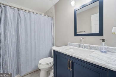 Completely updated and truly move-in ready, this elegant on Windermere Golf Club in Georgia - for sale on GolfHomes.com, golf home, golf lot