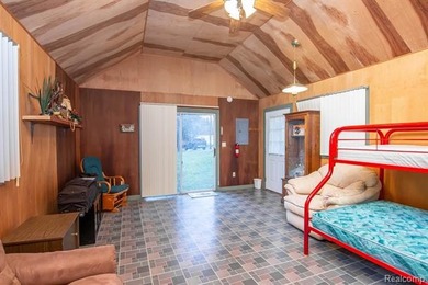 Welcome to this ranch style home built in 2001 offering over 1 on Lost Lake Woods Club in Michigan - for sale on GolfHomes.com, golf home, golf lot