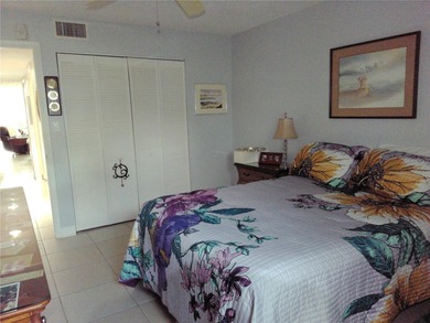 PARADISE!   This classy serene spacious Condo has a panoramic on East Bay Golf Club in Florida - for sale on GolfHomes.com, golf home, golf lot