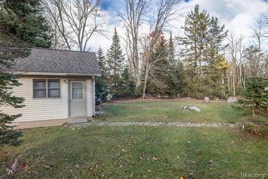 Welcome to this ranch style home built in 2001 offering over 1 on Lost Lake Woods Club in Michigan - for sale on GolfHomes.com, golf home, golf lot