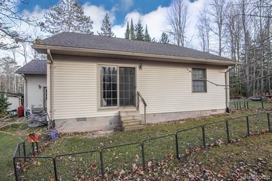 Welcome to this ranch style home built in 2001 offering over 1 on Lost Lake Woods Club in Michigan - for sale on GolfHomes.com, golf home, golf lot