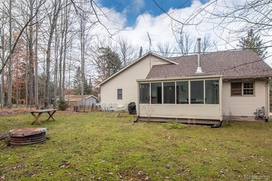 Welcome to this ranch style home built in 2001 offering over 1 on Lost Lake Woods Club in Michigan - for sale on GolfHomes.com, golf home, golf lot