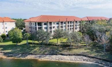 ***NOTE: the sliding door to the balcony is off the living room on Legacy Golf Club in Florida - for sale on GolfHomes.com, golf home, golf lot