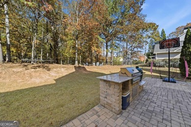 Completely updated and truly move-in ready, this elegant on Windermere Golf Club in Georgia - for sale on GolfHomes.com, golf home, golf lot