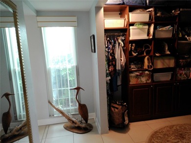 PARADISE!   This classy serene spacious Condo has a panoramic on East Bay Golf Club in Florida - for sale on GolfHomes.com, golf home, golf lot