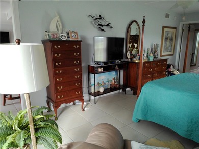 PARADISE!   This classy serene spacious Condo has a panoramic on East Bay Golf Club in Florida - for sale on GolfHomes.com, golf home, golf lot