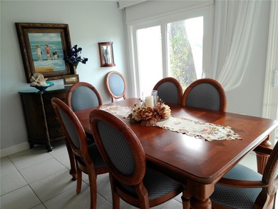 PARADISE!   This classy serene spacious Condo has a panoramic on East Bay Golf Club in Florida - for sale on GolfHomes.com, golf home, golf lot