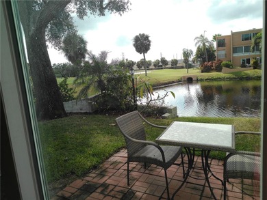 PARADISE!   This classy serene spacious Condo has a panoramic on East Bay Golf Club in Florida - for sale on GolfHomes.com, golf home, golf lot