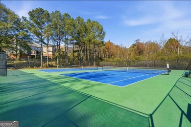 Completely updated and truly move-in ready, this elegant on Windermere Golf Club in Georgia - for sale on GolfHomes.com, golf home, golf lot