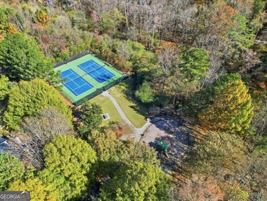 Completely updated and truly move-in ready, this elegant on Windermere Golf Club in Georgia - for sale on GolfHomes.com, golf home, golf lot