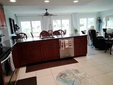 PARADISE!   This classy serene spacious Condo has a panoramic on East Bay Golf Club in Florida - for sale on GolfHomes.com, golf home, golf lot