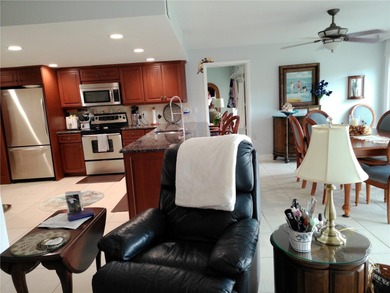 PARADISE!   This classy serene spacious Condo has a panoramic on East Bay Golf Club in Florida - for sale on GolfHomes.com, golf home, golf lot