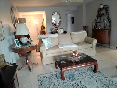 PARADISE!   This classy serene spacious Condo has a panoramic on East Bay Golf Club in Florida - for sale on GolfHomes.com, golf home, golf lot