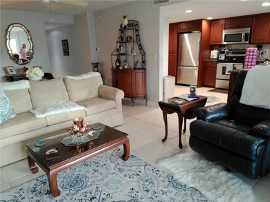PARADISE!   This classy serene spacious Condo has a panoramic on East Bay Golf Club in Florida - for sale on GolfHomes.com, golf home, golf lot