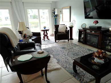 PARADISE!   This classy serene spacious Condo has a panoramic on East Bay Golf Club in Florida - for sale on GolfHomes.com, golf home, golf lot