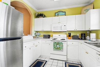 Beautiful 2-bedroom, 2-bathroom TURNKEY condo in Cypress Bend at on Barefoot Resort and Golf Club  in South Carolina - for sale on GolfHomes.com, golf home, golf lot