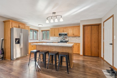 Welcome to this beautifully updated 3-bedroom, 2-bathroom home on Woods Edge Golf Course in Iowa - for sale on GolfHomes.com, golf home, golf lot