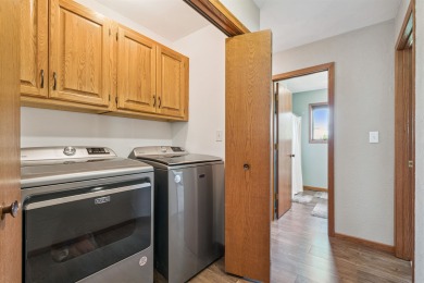 Welcome to this beautifully updated 3-bedroom, 2-bathroom home on Woods Edge Golf Course in Iowa - for sale on GolfHomes.com, golf home, golf lot