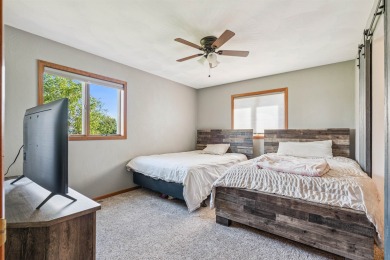 Welcome to this beautifully updated 3-bedroom, 2-bathroom home on Woods Edge Golf Course in Iowa - for sale on GolfHomes.com, golf home, golf lot