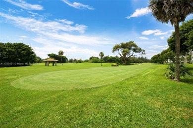 SPECTACULAR GOLF COURSE VIEWS FROM THIS BEAUTIFULLY UPGRADED on Palm-Aire Country Club and Resort - Palms in Florida - for sale on GolfHomes.com, golf home, golf lot