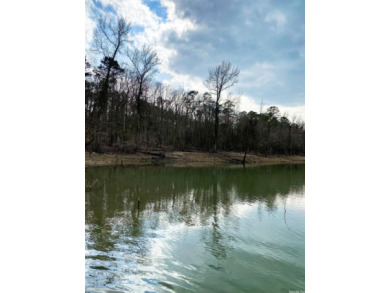Beautiful lakefront lot in the cove of Grand Isle Subdivision on Indian Hills Country Club in Arkansas - for sale on GolfHomes.com, golf home, golf lot