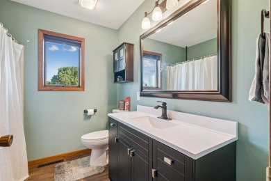 Welcome to this beautifully updated 3-bedroom, 2-bathroom home on Woods Edge Golf Course in Iowa - for sale on GolfHomes.com, golf home, golf lot