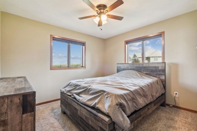 Welcome to this beautifully updated 3-bedroom, 2-bathroom home on Woods Edge Golf Course in Iowa - for sale on GolfHomes.com, golf home, golf lot