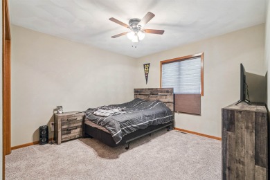 Welcome to this beautifully updated 3-bedroom, 2-bathroom home on Woods Edge Golf Course in Iowa - for sale on GolfHomes.com, golf home, golf lot
